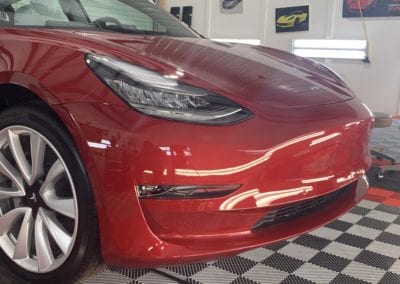 Photos of a New Car Preparation of a 2019 Tesla Model 3