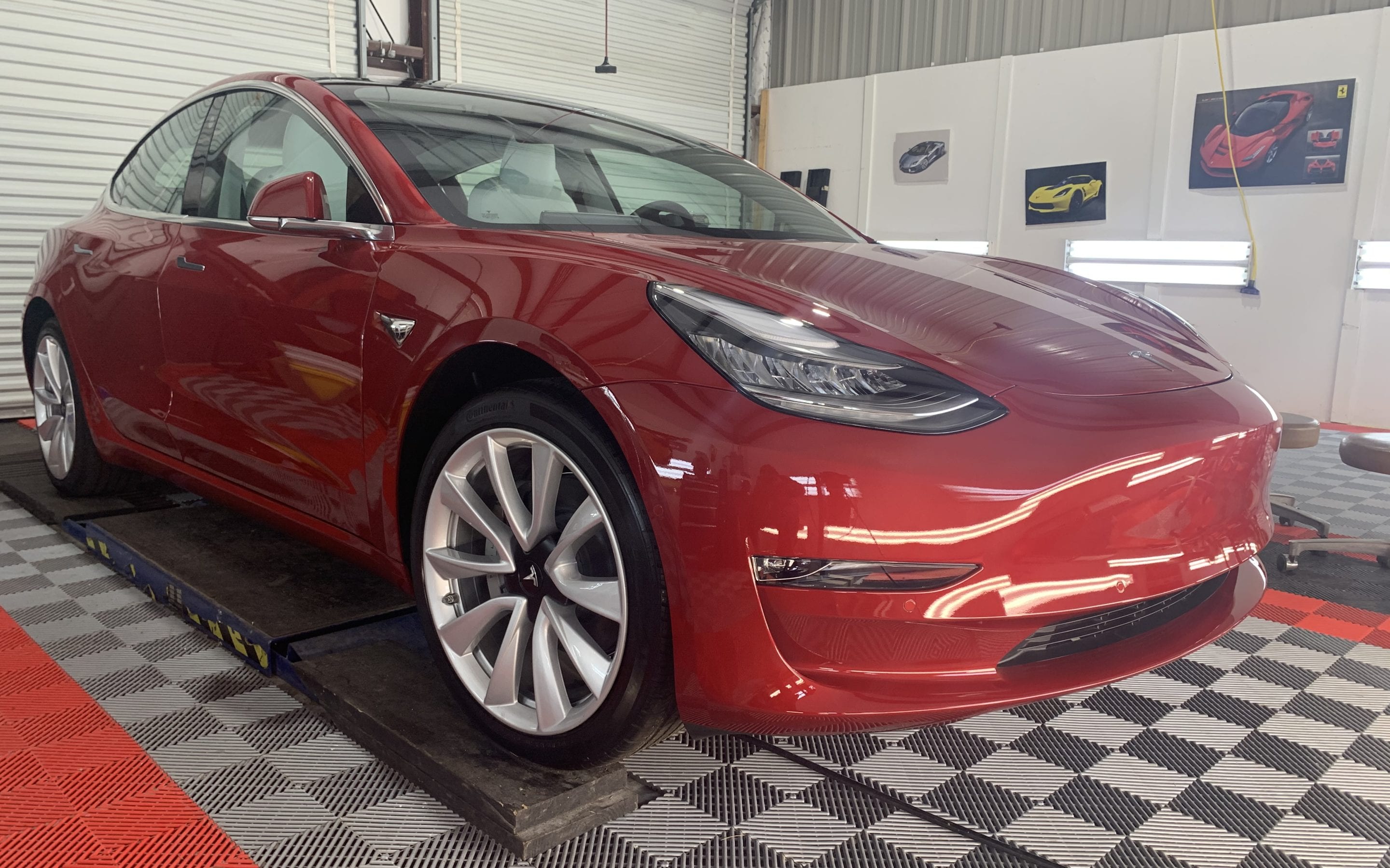 Photos of a New Car Preparation of a 2019 Tesla Model 3