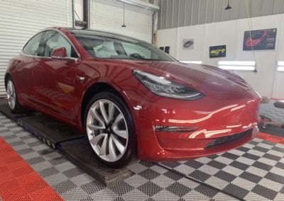 Photos of a New Car Preparation of a 2019 Tesla Model 3