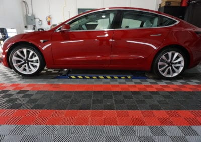 Photos of a New Car Preparation of a 2019 Tesla Model 3